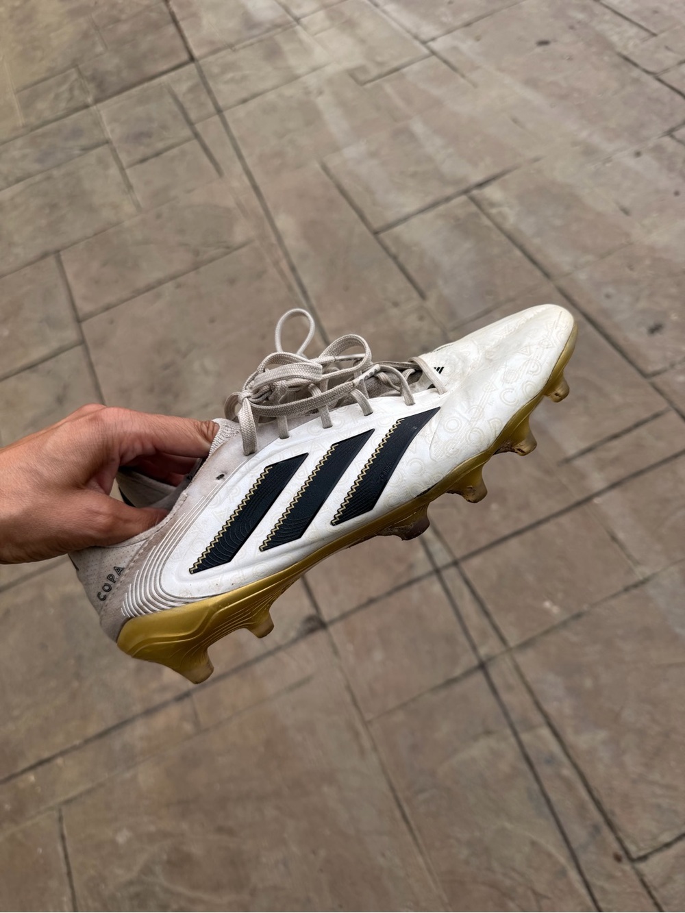 adidas Men’s White Soccer Cleats with Black Stripes and Gold Sole